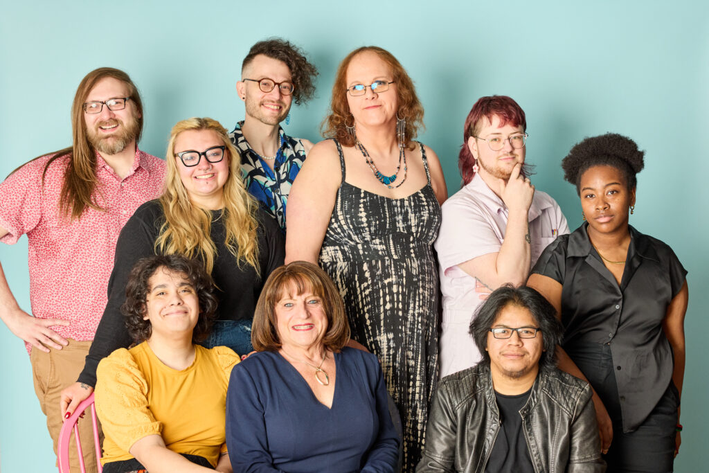 A group photo of the Board of Directors, including Liam, Brinkley, Esperanza, Ximón, Patti, Laurel, Finn, Alexander, and D.